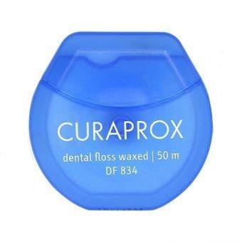Przejdź do produktu CURAPROX DF834 nić miętowa, lekko woskowana 50m.